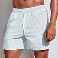 Ralf – Striped Swim Shorts - Image 1